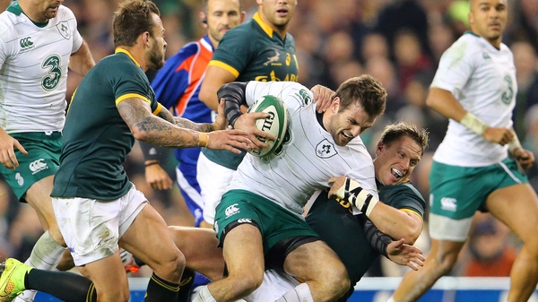 Jared Payne in battle during Ireland's 2014 clash with South Africa at the Aviva Stadium
