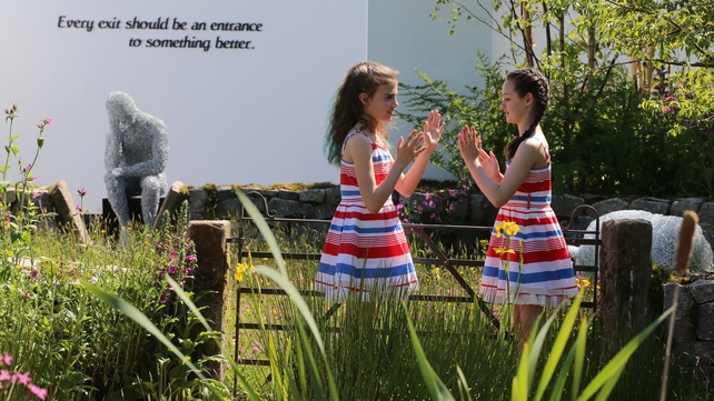 Brianna Deevy (L) and Katelyn Bailey (R) in the Across Boundries garden by Barry Kavanagh
