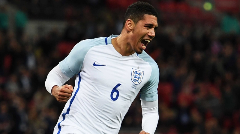 Chris Smalling wheels away in celebration