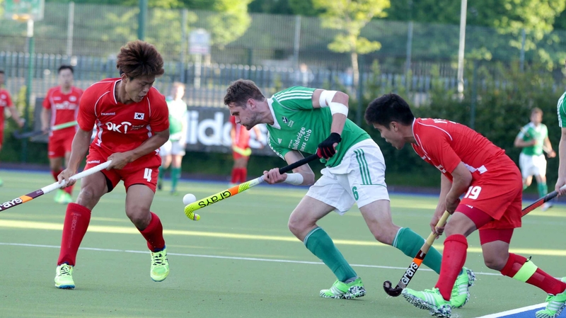 Ireland's Paul Gleghorne with Namyong Lee and Hyosik You of Korea