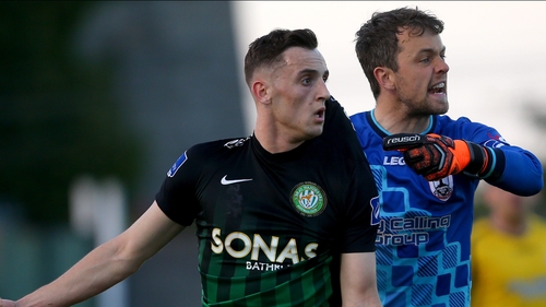 Dylan Connolly in a tangle with keeper Paul Skinner