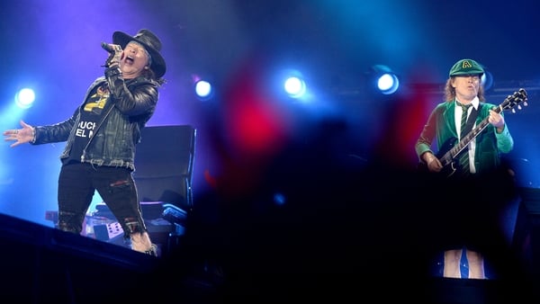 Axl Rose and Angus Young performing as AC/DC