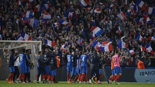 France salute the fans after the game