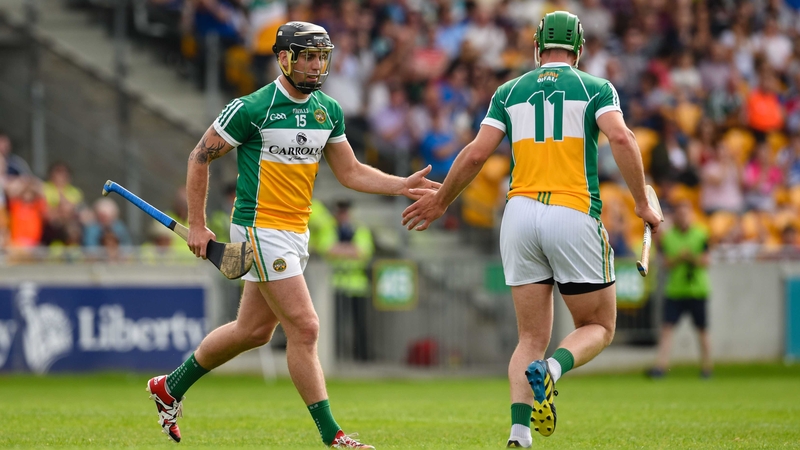 Shane Dooley celebrates his goal with Joe Bergin