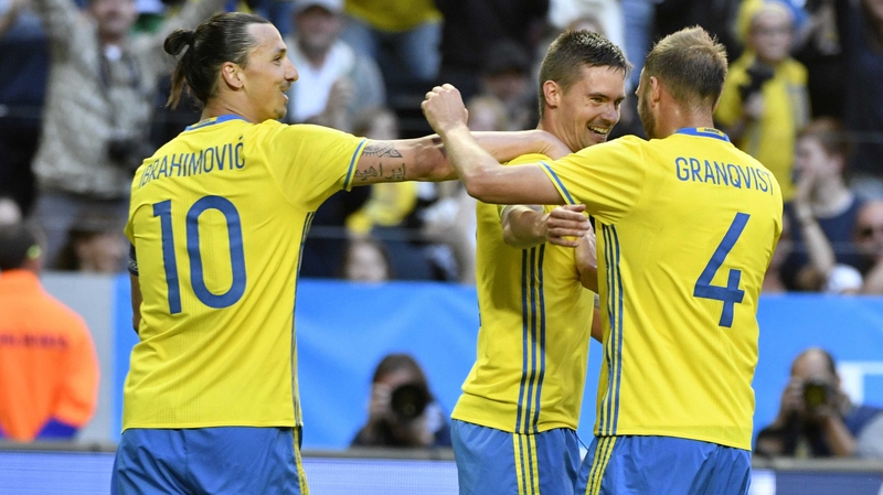 Mikael Lustig of Sweden celebrates with Zlatan Ibrahimovic and Andreas Granqvist