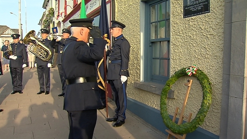 A wreath was laid beneath a plaque to Det Gda McCabe's memory outside Adare Garda Station