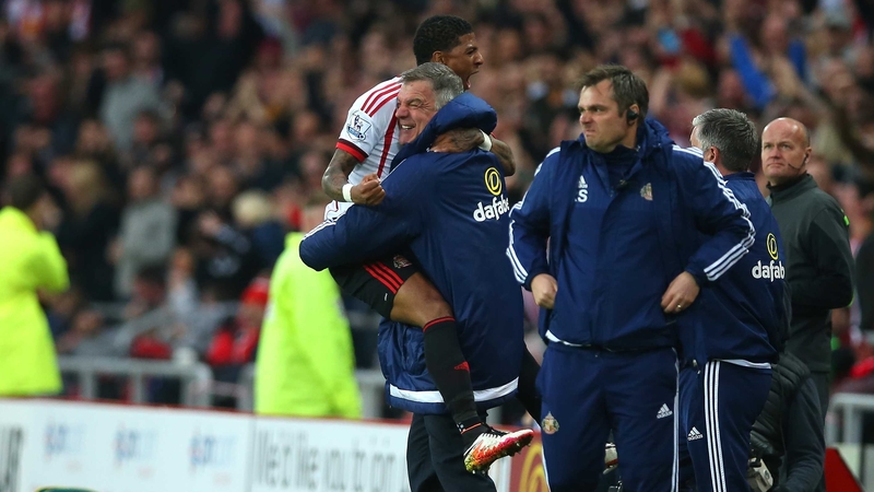 Patrick van Aanholt leaps into Sam Allardyce's arms after his goal against Everton last month