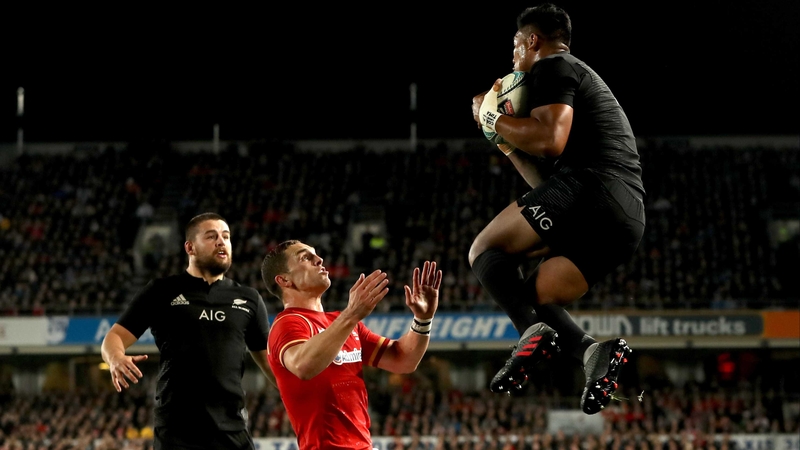 Julian Savea collects high ball to score a try