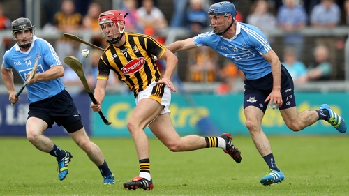 Cillian Buckley gets away from Daire Plunkett