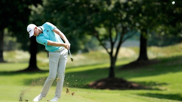 Daniel Berger plays his second shot on the sixth hole