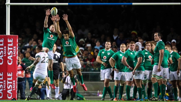 Keith Earls and Conor Murray try to charge down a conversion by Elton Jantjies