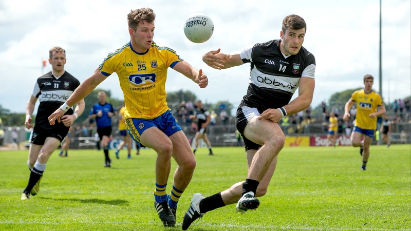 Roscommon's Sean Mulooly with Pat Hughes of Sligo