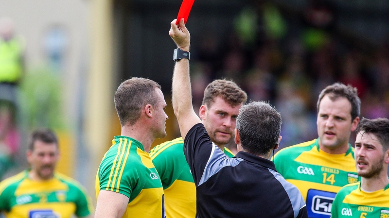 Neil McGee (L) is sent off against Fermanagh