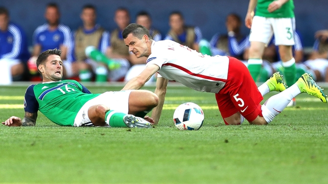 Oliver Norwoo battles with Poland's Krzysztof Maczynski