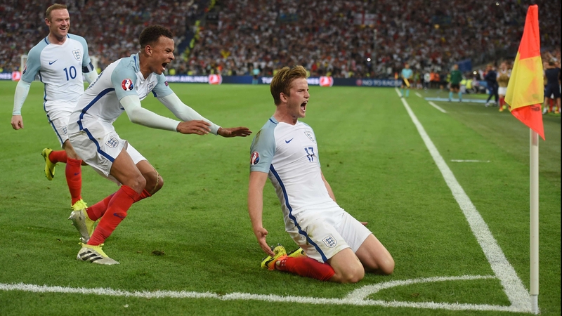 Eric Dier celebrates opening the scoring against Russia