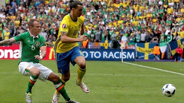 Zlatan Ibrahimovic dance's around Glenn Whelan