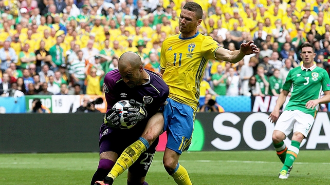 Ireland keeper Darren Randolph is challenged by Sweden's Marcus Berg