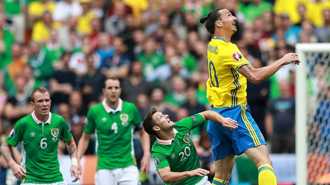 Little and large - Zlatan Ibrahimovic and Wesley Hoolahan contest an aerial ball. Zlatan had a quiet first half