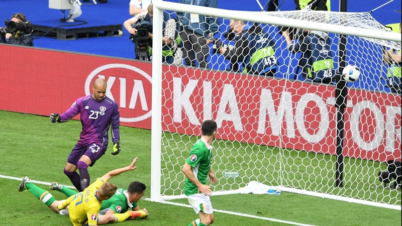 Clark watches on helpless as his wayward header hits the back of the Ireland net on Monday