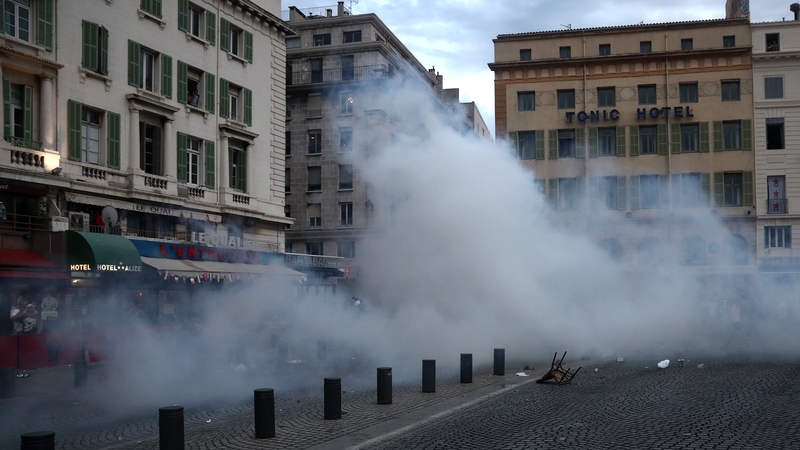 Police used tear gas to disperse crowds after violence erupted in Marseille