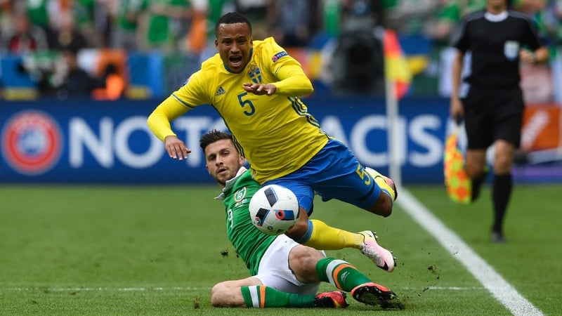 Martin Olsson goes down after a string Shane Long tackle