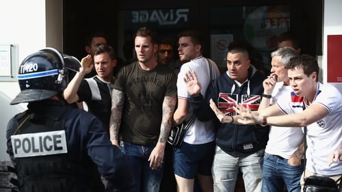 England fans retreat from police in Lille