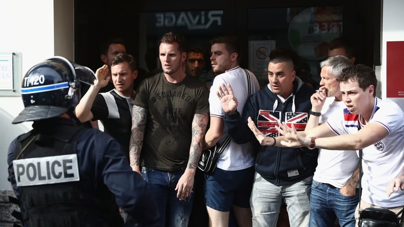 England fans retreat from police in Lille