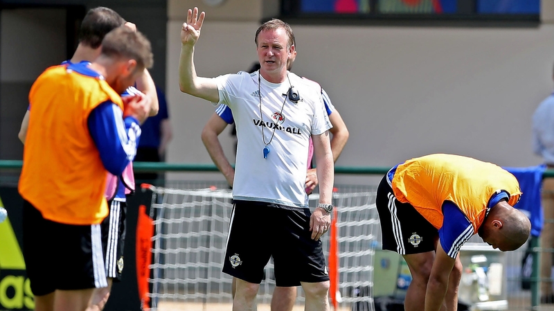 O'Neill directs his Northern Ireland players at a recent training session in France