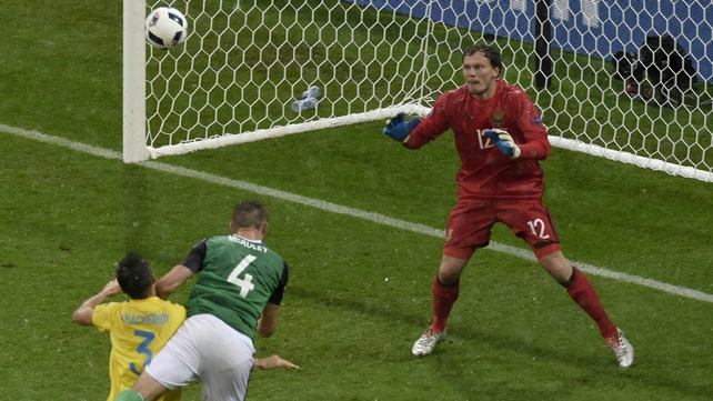 Gareth McAuley heads home that crucial opening goal