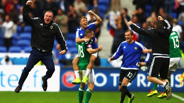 Manager Michael O'Neill jumps for joy on the final whistle