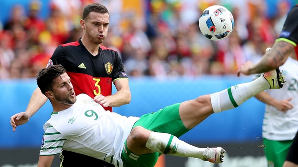 Shane Long battles for possession