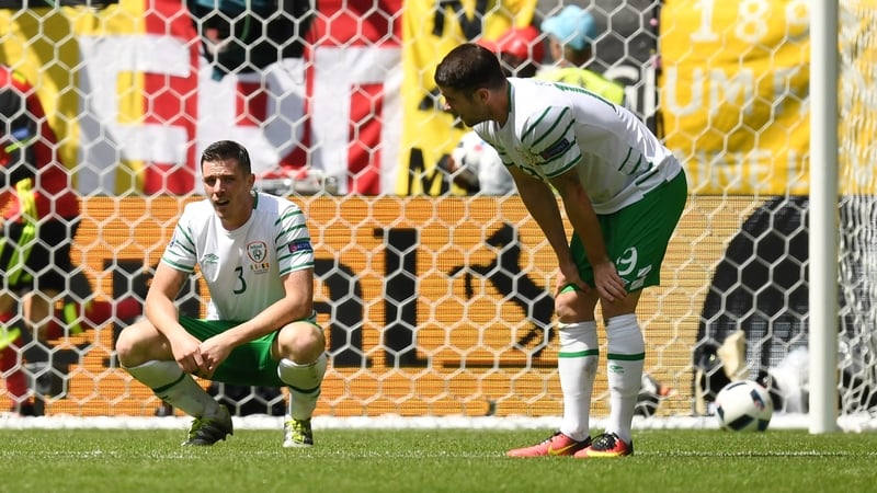 A dejected Ciarán Clark and Robbie Brady