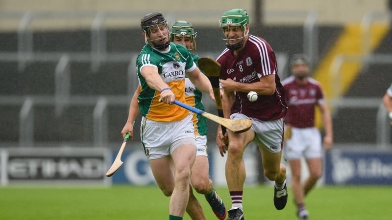 Offaly's Sean Gardiner and David Burke of Galway
