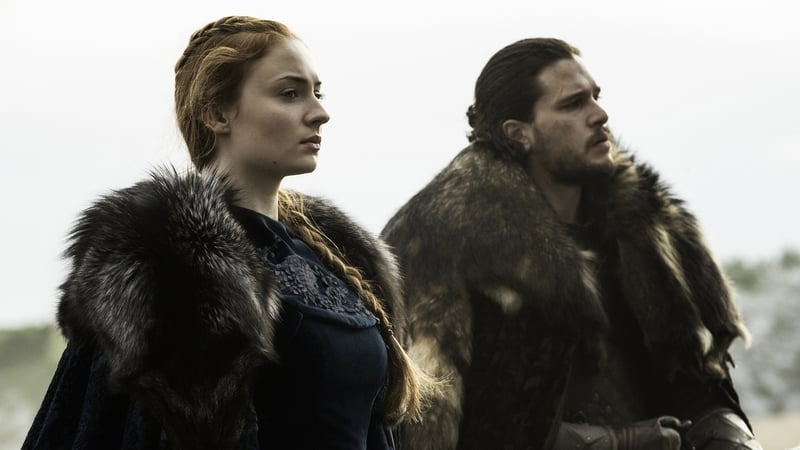 Sophie Turner and Kit Harington as Sansa Stark and Jon Snow