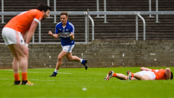 Laois forward Ross Munnelly celebrates what he thought was the winning score against Armagh
