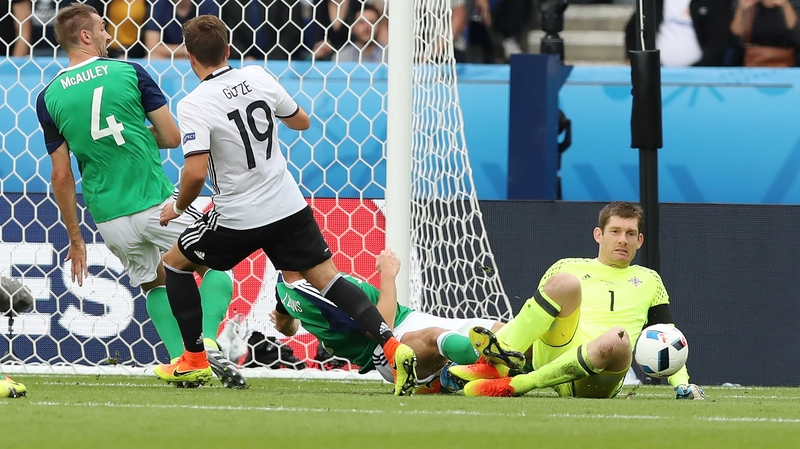 Michael McGovern makes one of a string of fine saves from Germany's Mario Gotze