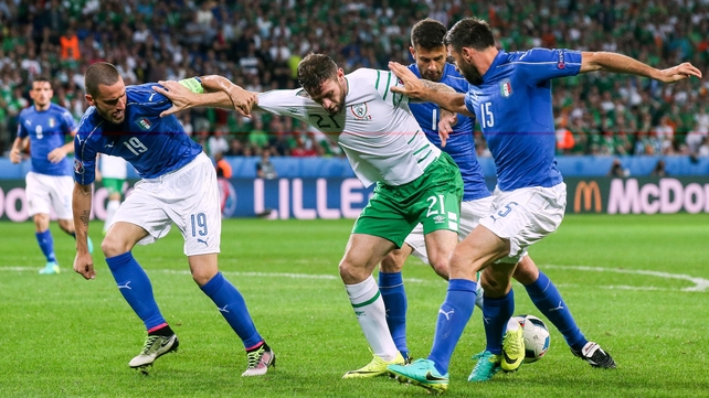 Daryl Murphy battles for possession