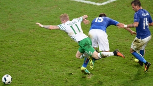 Andrea Barzagli sends James McClean tumbling in the penalty area