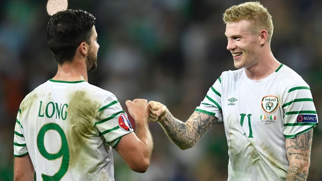Shane Long (L) and James McClean relish the victory