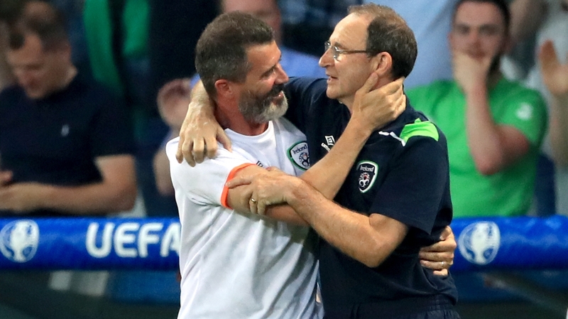 Roy Keane and Martin O'Neill celebrate qualifying for the round of 16