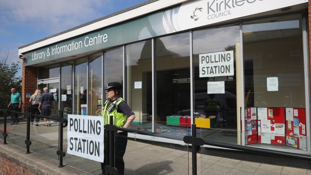 People arrive at Birstall Library to cast their vote one week after the murder of Jo Cox MP, outside the library
