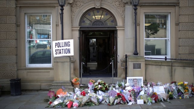 Floral tributes to Jo Cox MP adorn Batley Town Hall as people cast their votes