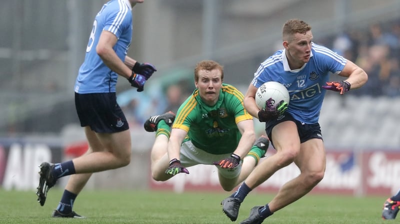 Ciaran Kilkenny avoids the despairing dive of Meath's Dalton McDonagh