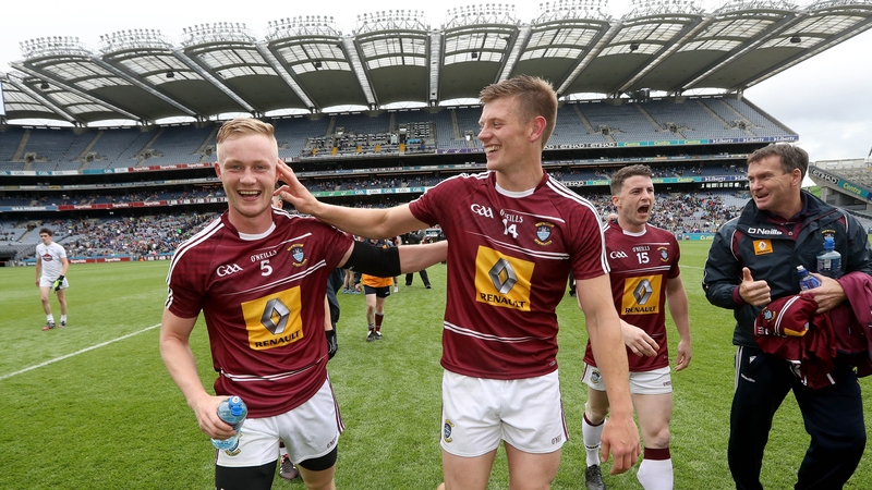 Westmeath's Killian Daly and John Heslin celebrate their one-point win over the Lilywhites