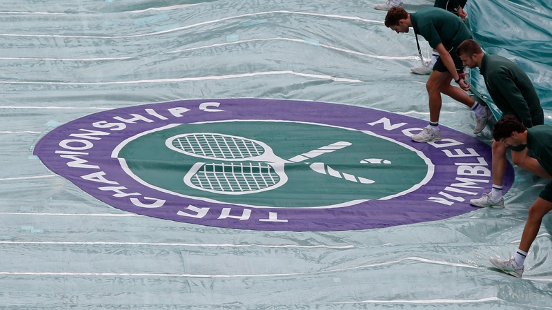 Wimbledon was hit by heavy rain on day two