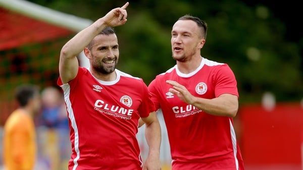 Christy Fagan celebrates his goal with Graham Kelly