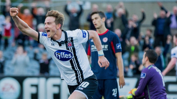 Dundalk's Ronan Finn wheels away in celebration after scoring against St Pat's