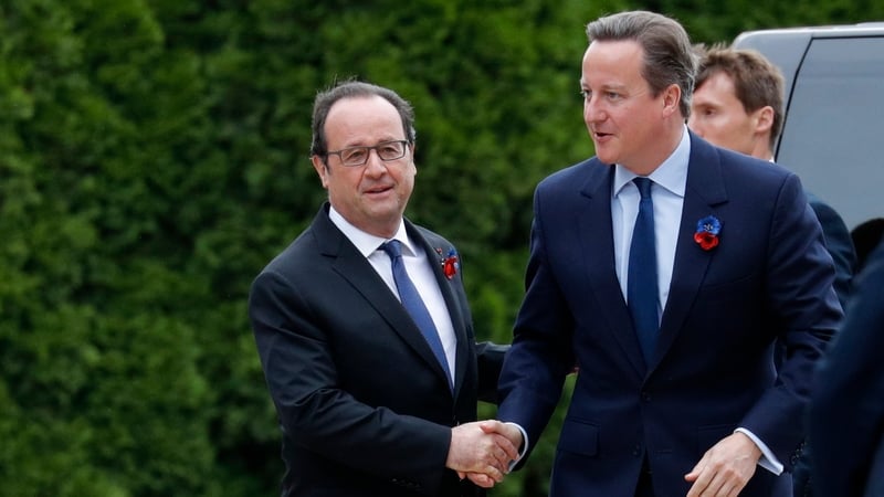 Francois Hollande greets David Cameron at the Battle of Somme commemoration ceremony in France