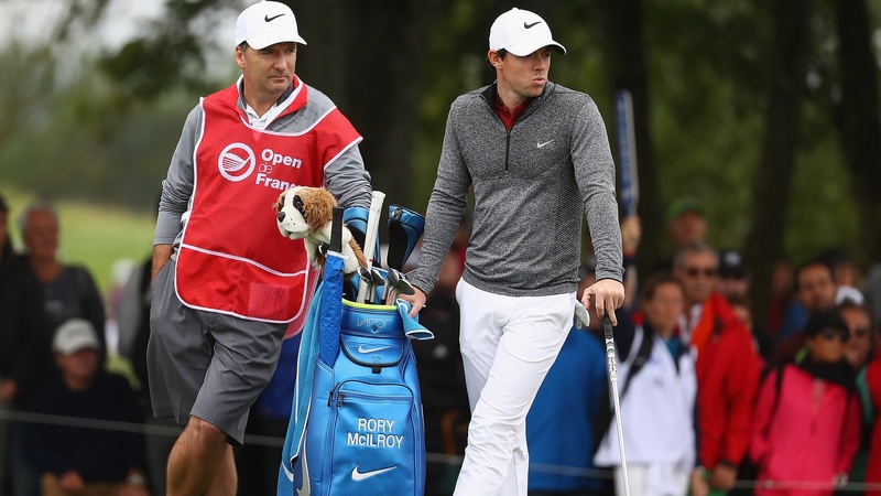 McIlroy and caddie JP Fitzgerald look on during the second round at the French Open