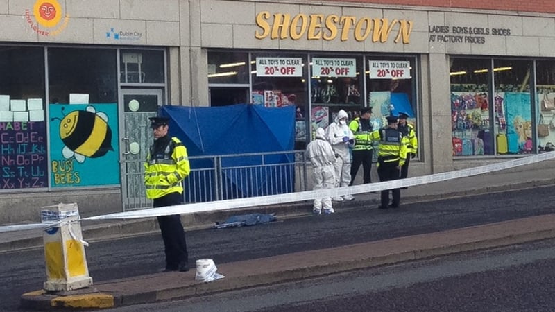 The man was shot up to four times by a gunman in the head and chest near the entrance to a shop on Bridgefoot Street